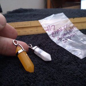 Orange and white simulated Chakra gemstone pendat pair in silver tone clip.